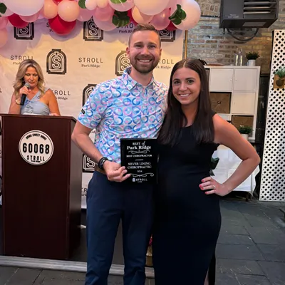 Chiropractor Park Ridge IL Ryan And Gina Maxwell With Award